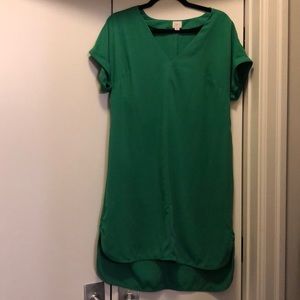 Green short sleeved dress with high low hem